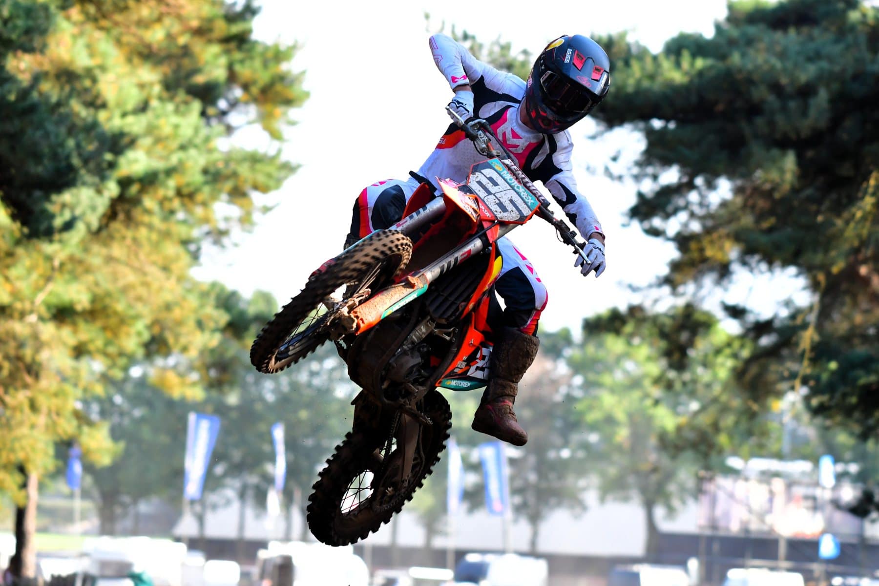 Rider whipping over the trees